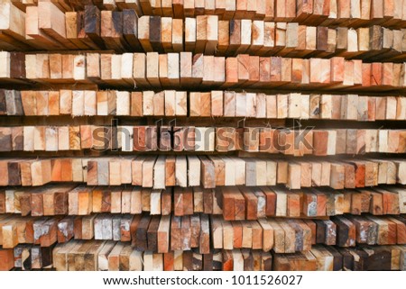 Stacked wooden planks.