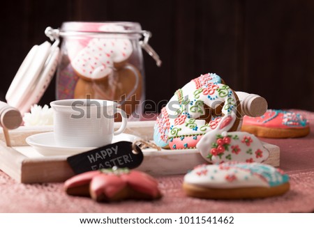 beautiful easter cookies with a cup of coffee