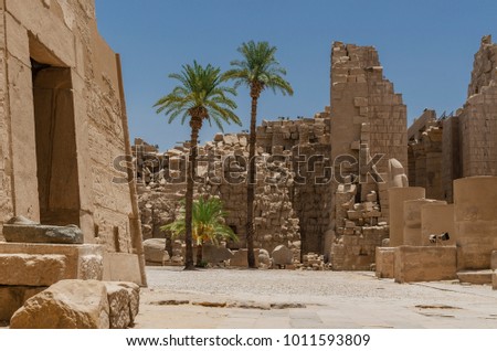 Ruins of the Karnak Temple in Luxor, Egypt. Ruined wall. Ancient architecture in Luxor, Egypt