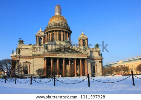 Saint Isaac's Cathedral in St. Petersburg, Russia. Historical Old Architecture, Granite Stone Building Winter View on Sunny Day with Empty Clear Blue Sky. Travel Landmark Scenic Beautiful Picture.