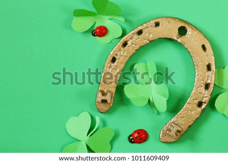 golden horseshoe symbol of good luck for a holiday St. Patrick's Day