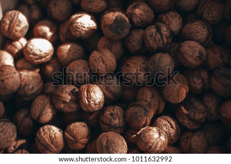 background of walnuts. dry nuts. useful and healthy food. delicious additive