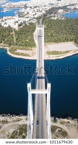 Aerial drone photo of suspension bridge connecting an island with mainland