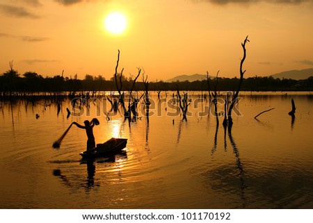 fisherman in the vast fresh water