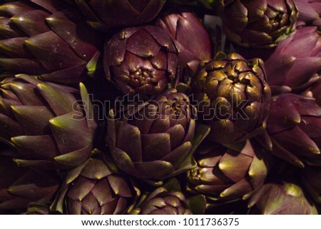 Artichoke background. Asparagus family, market stock photography