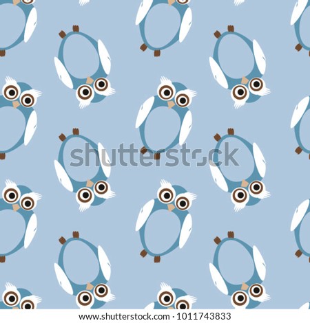 Blue owls on a blue background. Vector, Seamless pattern.
