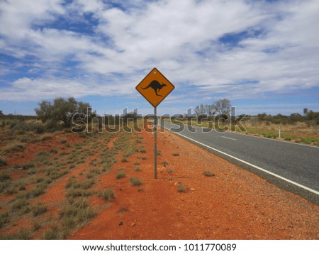 Kangaroos sign on country road in Australian outback