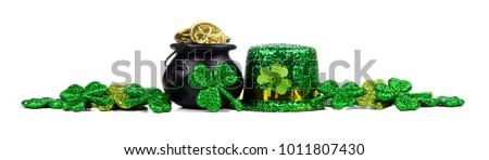 St Patricks Day Pot of Gold, shamrocks and leprechaun hat. Long border over a white background.
