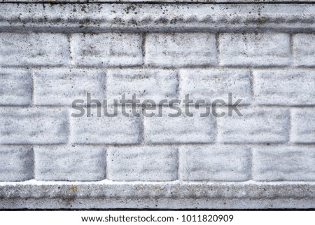 grunge plaster texture with gray bricks