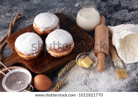 german donuts or berliner with ingredient on grey background Royalty-Free Stock Photo #1011821770