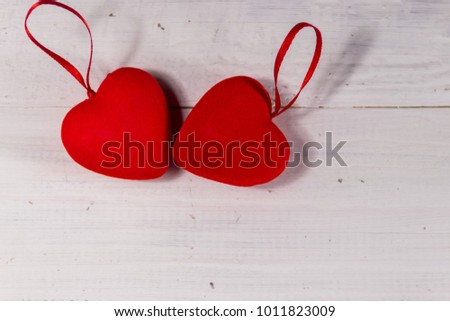 Two red hearts on white wooden background. Top view, copy space