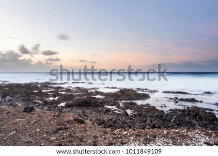 
sunset with violet sky in the sea