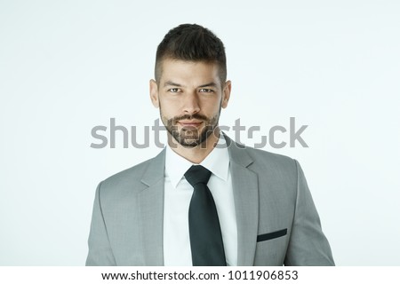Portrait of businessman over white background.