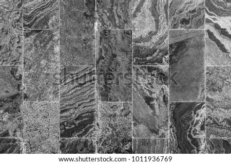 Abstract background from black and white marble texture  and pattern. Retro and vintage wall can decorated both of indoor and outdoor. Picture for add text message. Backdrop for design art work.