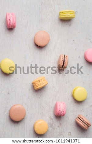 Macarons are small round delicious french confections, made with meringue and a sweet flavored filling. Commonly found in french bakeries, these tasty treats are light, crisp and often colorful.