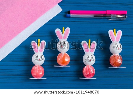 Making Easter bunny from lollipop. Sweet gift to children. Creative idea for children's party. DIY concept. Step by step photo instructions. Step 7. Draw hare's face