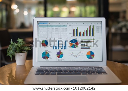 accounting financial concept.  business presentation software on computer screen by e-learning computer training at home. Royalty-Free Stock Photo #1012002142