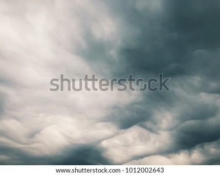 Abstract cloudy climate with dark gray tone colors and nature scene of storm weather.