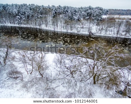 Vilnius, Lithuania: aerial top view of ice drift in Neris river in winter