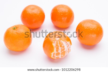 Tangerine fruits isolated on white