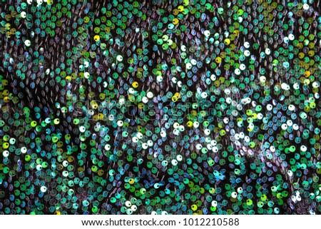 Sequined fabric texture as background
