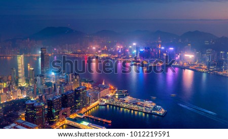Hong Kong city skyline with Victoria Harbor view at twilight from top view
