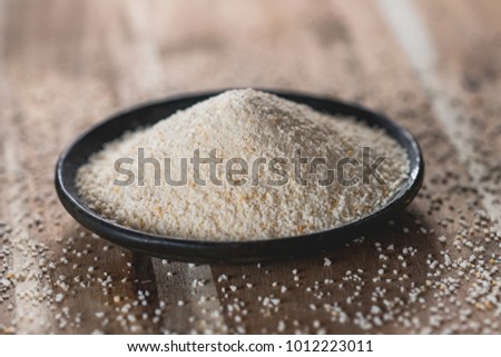 Bread crumbs on wooden background