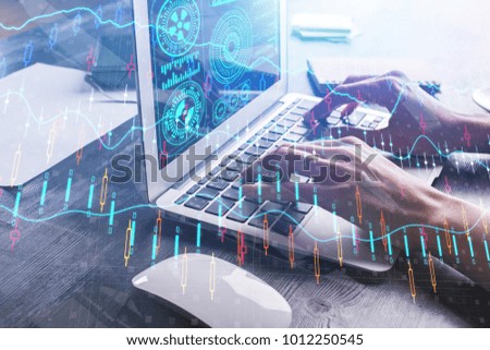 Close up of hands using laptop with abstract digital forex chart. Technology and investment concept. Double exposure 