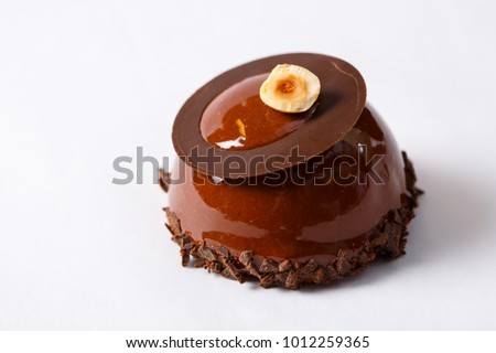 Chocolate glazed cake Royalty-Free Stock Photo #1012259365