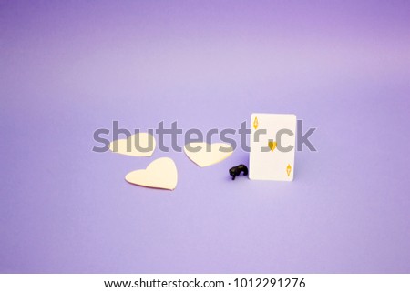 Cat with hearts for Valentine's Day on colorful background