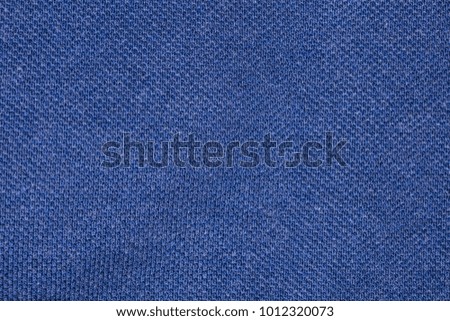 blue fabric, closeup on stitch