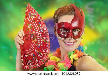 Girl enjoying the carnival dancing costumed in Brazil
