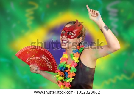 Girl enjoying the carnival dancing costumed in Brazil
