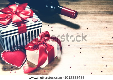 St Valentine's background with presents and red wine. Greeting card concept 