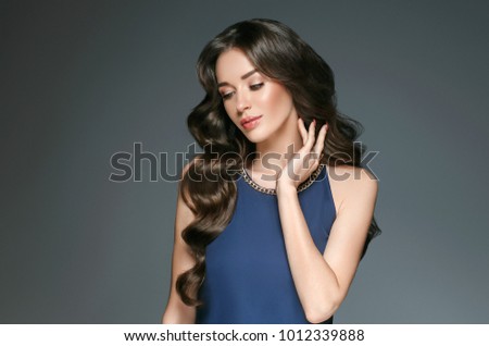 Female hairstyle long brunette beauty woman healthy skin and haie beautiful portrait.