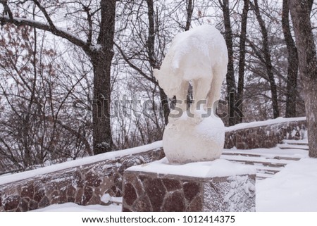 Sculpture of a Panther in a city Park in winter