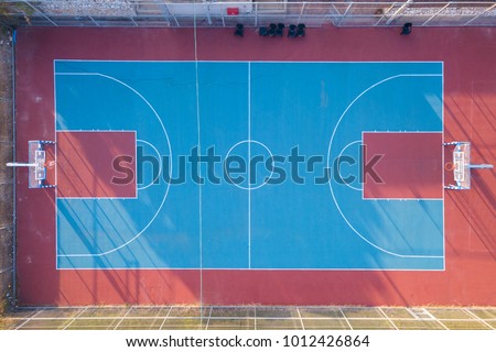 Public Basketball court - Tops down aerial image Royalty-Free Stock Photo #1012426864
