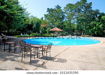 Swimming pool with outdoor chair