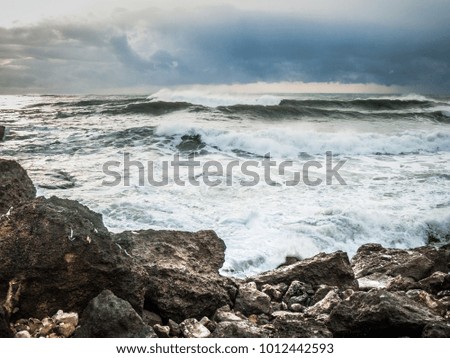 A small storm at sunset on the Mediterranean Sea near Rosh Hanikra in Israel