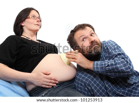 Funny picture of a pregnant woman and her husband.