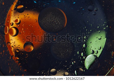 Beautiful abstract space background. Water drops of different colours
