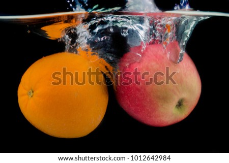 Fruit splash in the water.
