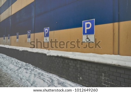 signs disabled Parking on the building