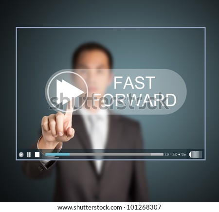 business man push fast forward button on touch screen to speed up video clip