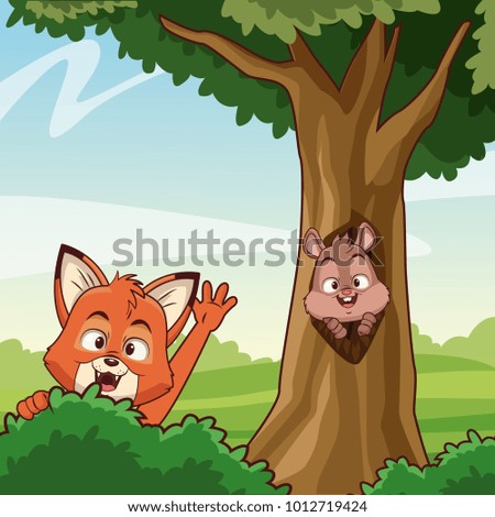 Cat and squirrel at forest