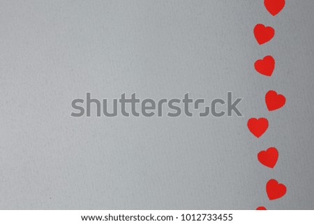 hearts on a gray background, a lot of free copy space, the concept of the day of all lovers
