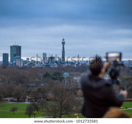 Shooting video in the morning at Primrose hill, London, UK