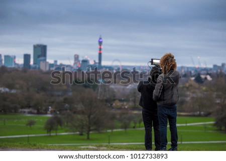 Shooting video in the morning at Primrose hill, London