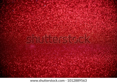 red glitter bokeh lights Blurred abstract background for Valentines, birthday, anniversary, wedding, new year and Christmas.