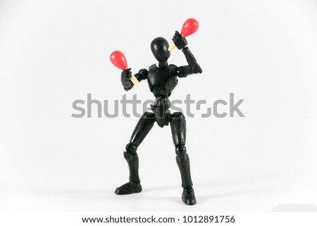 Black robot figure play music instrument